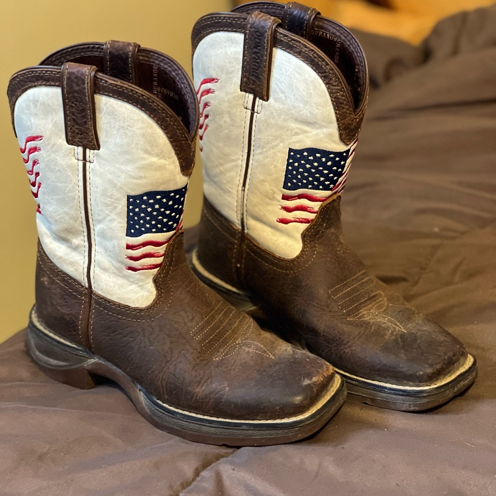 Great little boots with a lot of life left. American flag adds some flare!